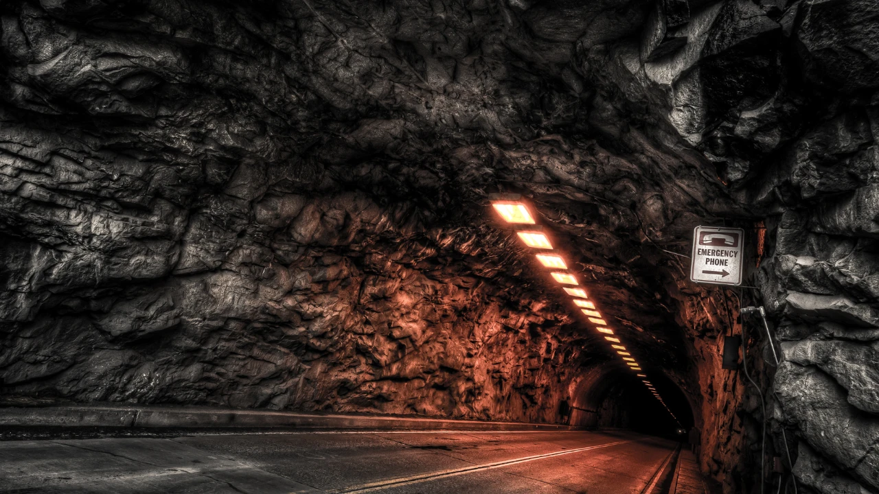 A dark concrete tunnel.